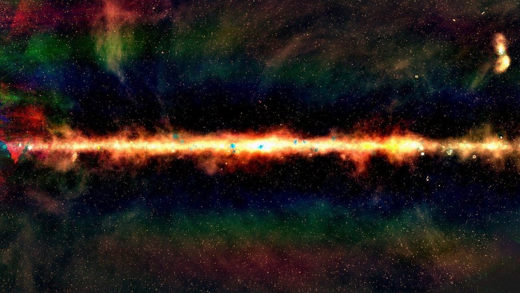 The GLEAM view of the centre of the Milky Way, in radio colour. Red indicates the lowest frequencies, green indicates the middle frequencies and blue the highest frequencies. Each dot is a galaxy, with around 300,000 radio galaxies observed as part of the GLEAM survey. Credit: Natasha Hurley-Walker (Curtin / ICRAR) and the GLEAM Team.