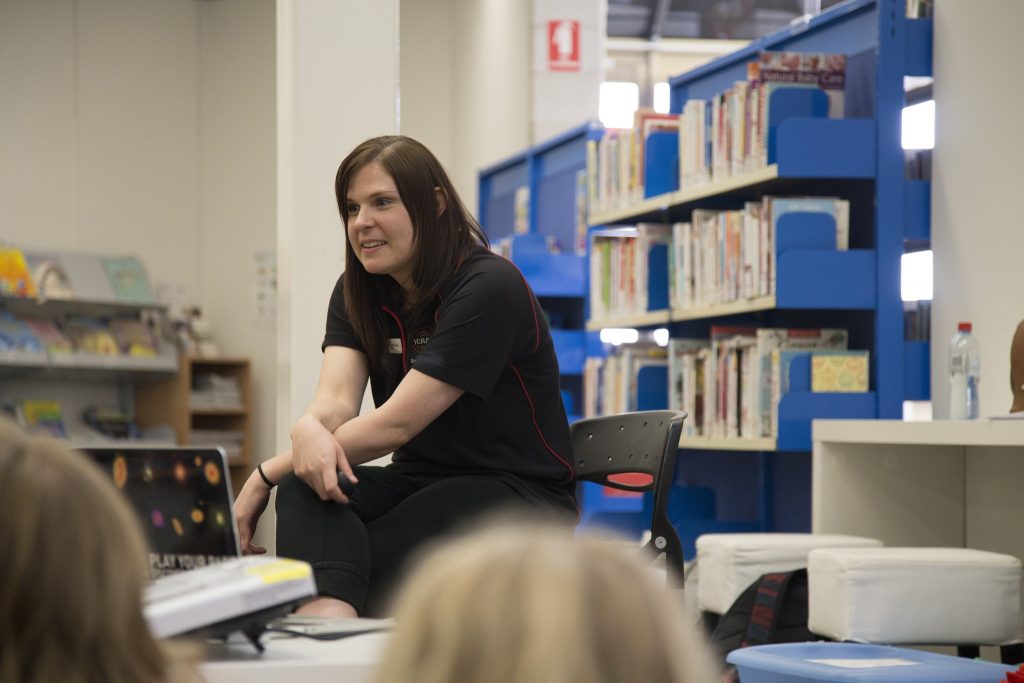 ICRAR PhD Candidate and high school teacher Ms Sarah Bruzzese teaching children about the Solar System at a local library. Credit: ICRAR.