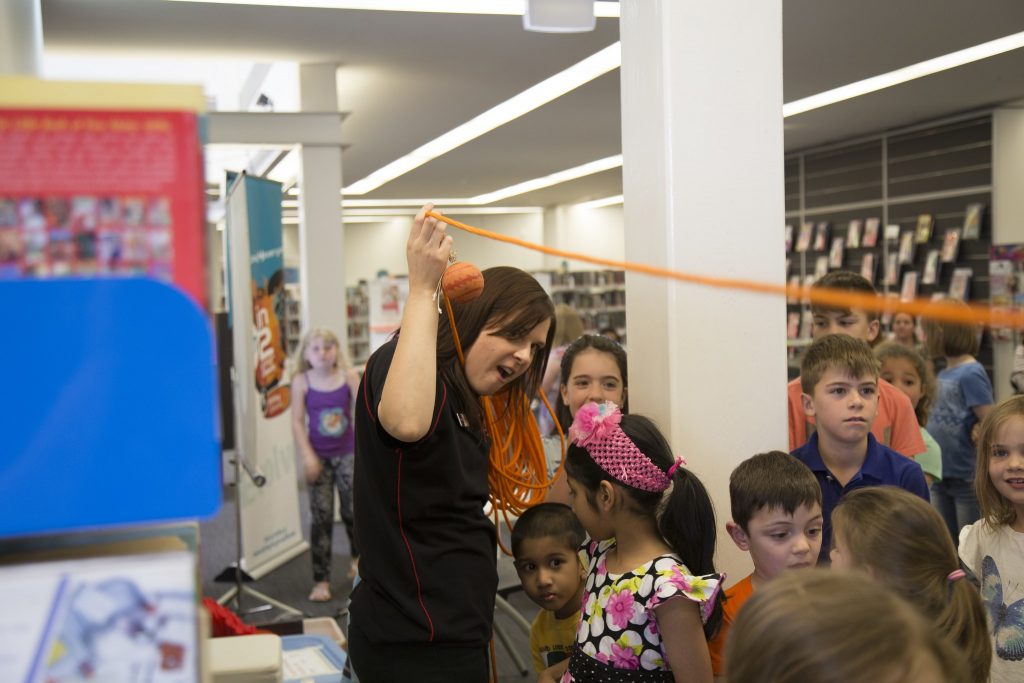 ICRAR PhD Candidate and high school teacher Ms Sarah Bruzzese teaching children about the Solar System at a local library. Credit: ICRAR.